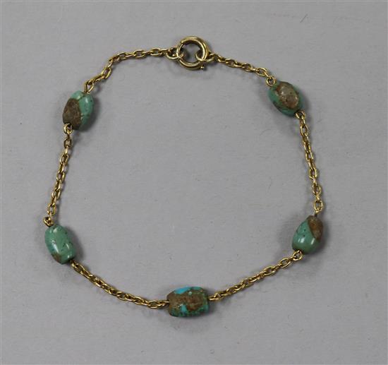An Edwardian yellow metal and turquoise set bracelet.